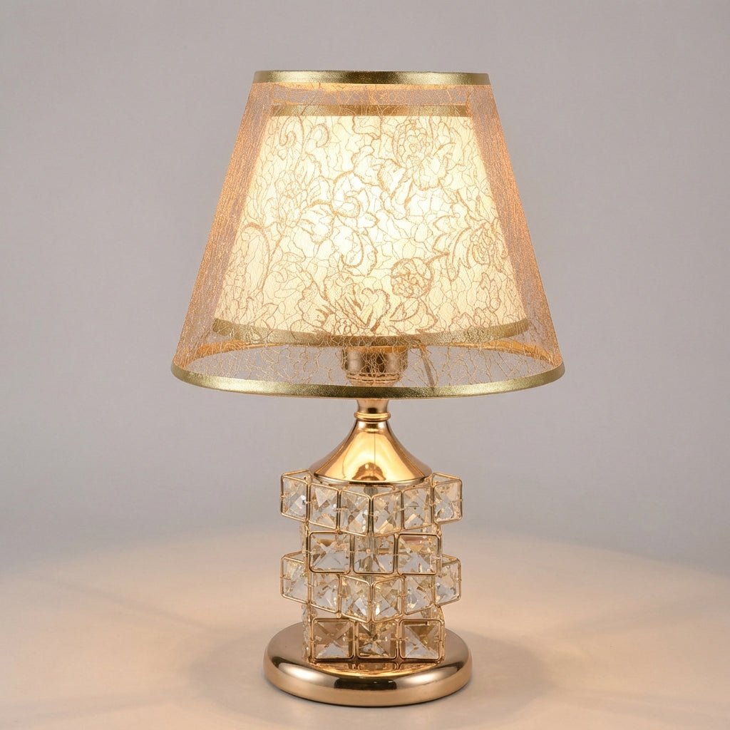 Dimmable crystal table lamp in silver, providing sophisticated accent lighting for any room.
