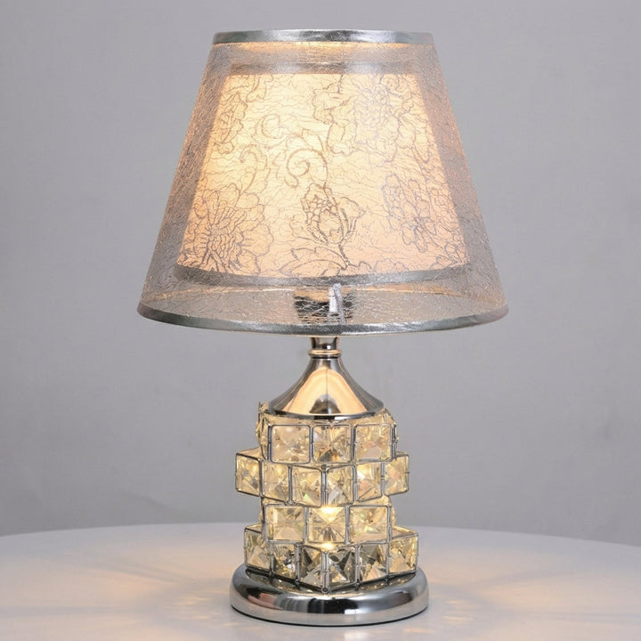 Modern gold-based crystal table lamp, offering both elegant home decor and practical LED lighting.