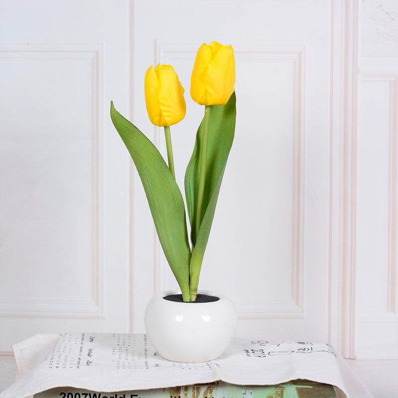 Softly glowing LED tulip light creating romantic lighting and a cozy ambiance, perfect for intimate evenings and relaxation.
