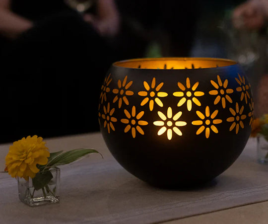 Elegant floral ceramic candle warmer and essential oil diffuser with dimmable light for home ambiance.