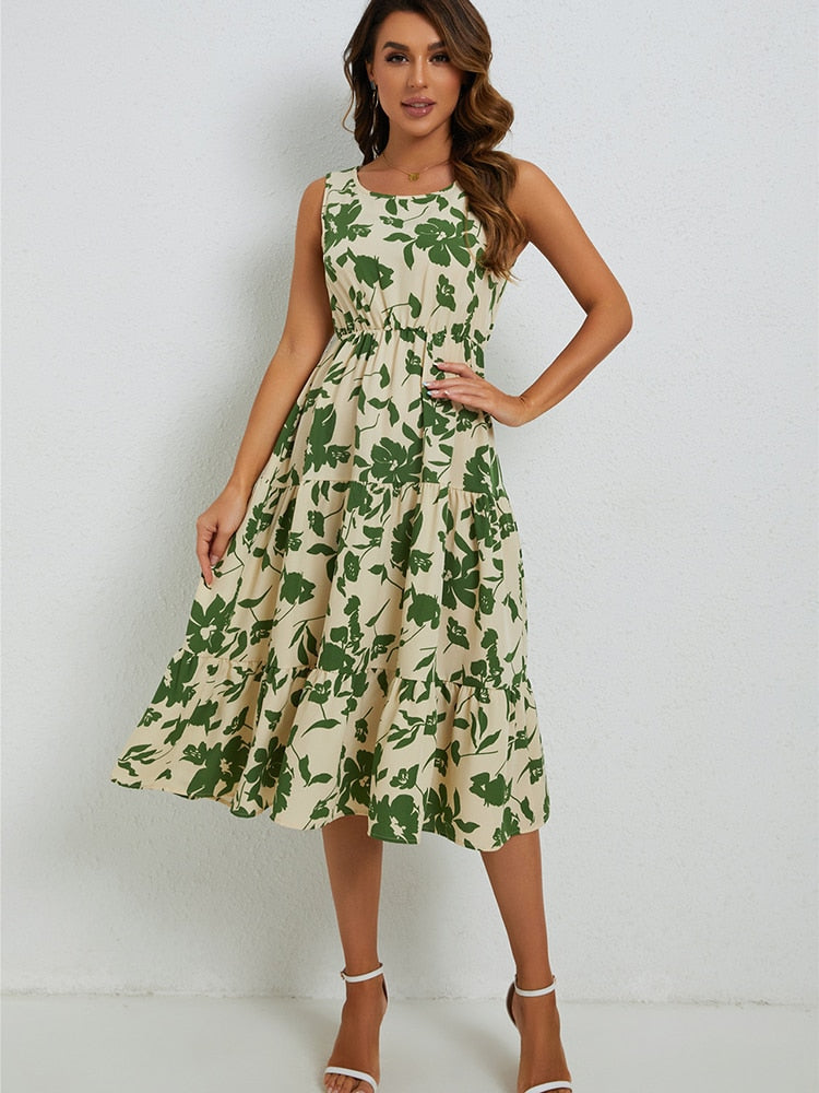 Flowy sleeveless midi dress for women, featuring a vibrant floral print, ideal for comfortable summer days.