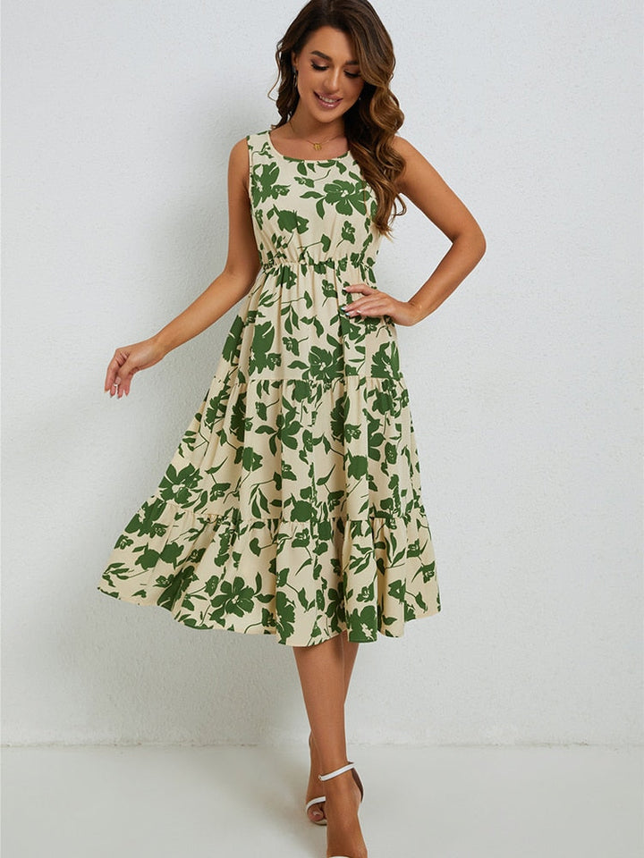 Women's elegant floral print midi dress, a chic summer fashion choice, perfect for casual or party events.