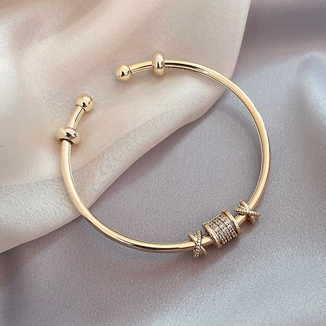 Elegant French style bangle bracelet for women, a chic and sophisticated fashion accessory perfect for any occasion.