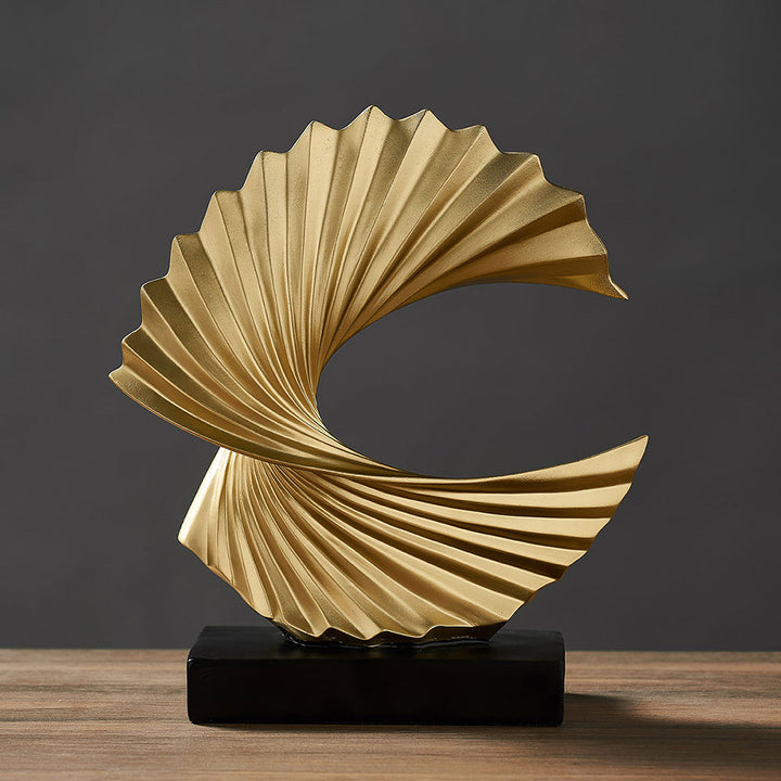 White & gold resin crescent moon sculpture, abstract tabletop celestial decor for contemporary homes.