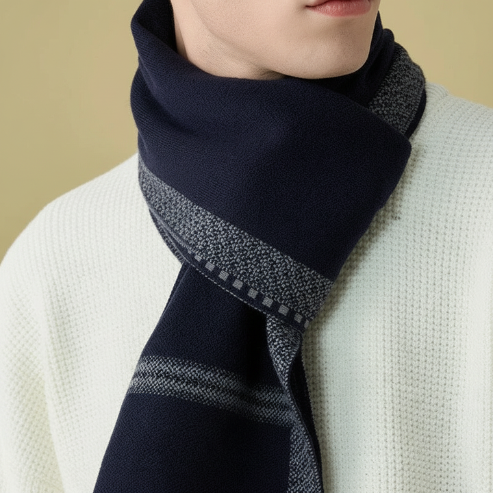 Stylish man wearing a high-quality men's cashmere winter scarf, showcasing its elegant draping and warmth.