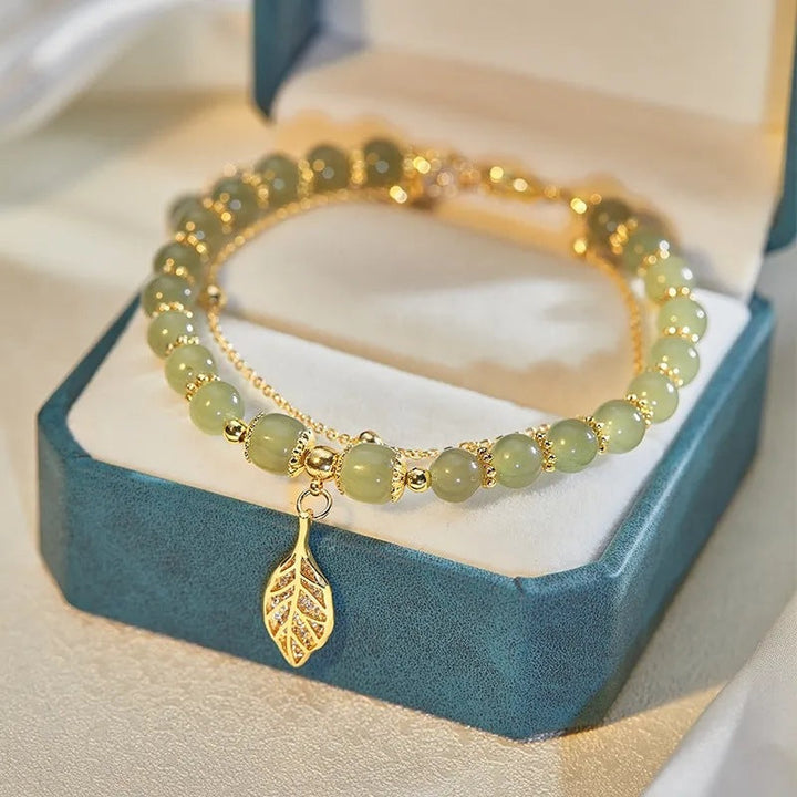 Natural green jade leaf bracelet. Women's adjustable jewelry with polished jade stone.