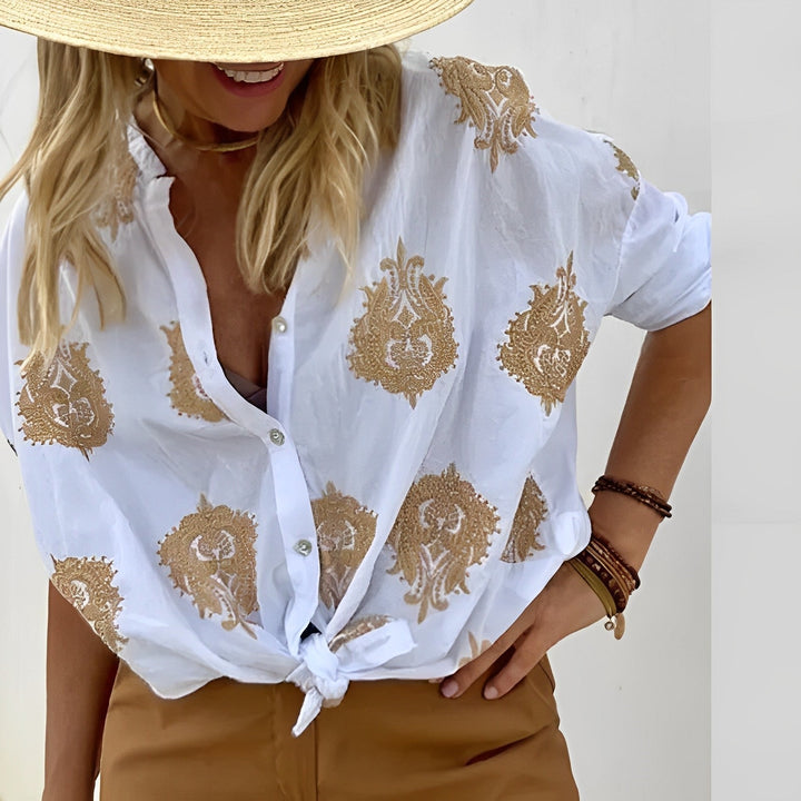 Stylish Isabelle women's blouse with a tailored fit, made from breathable fabric ideal for summer.