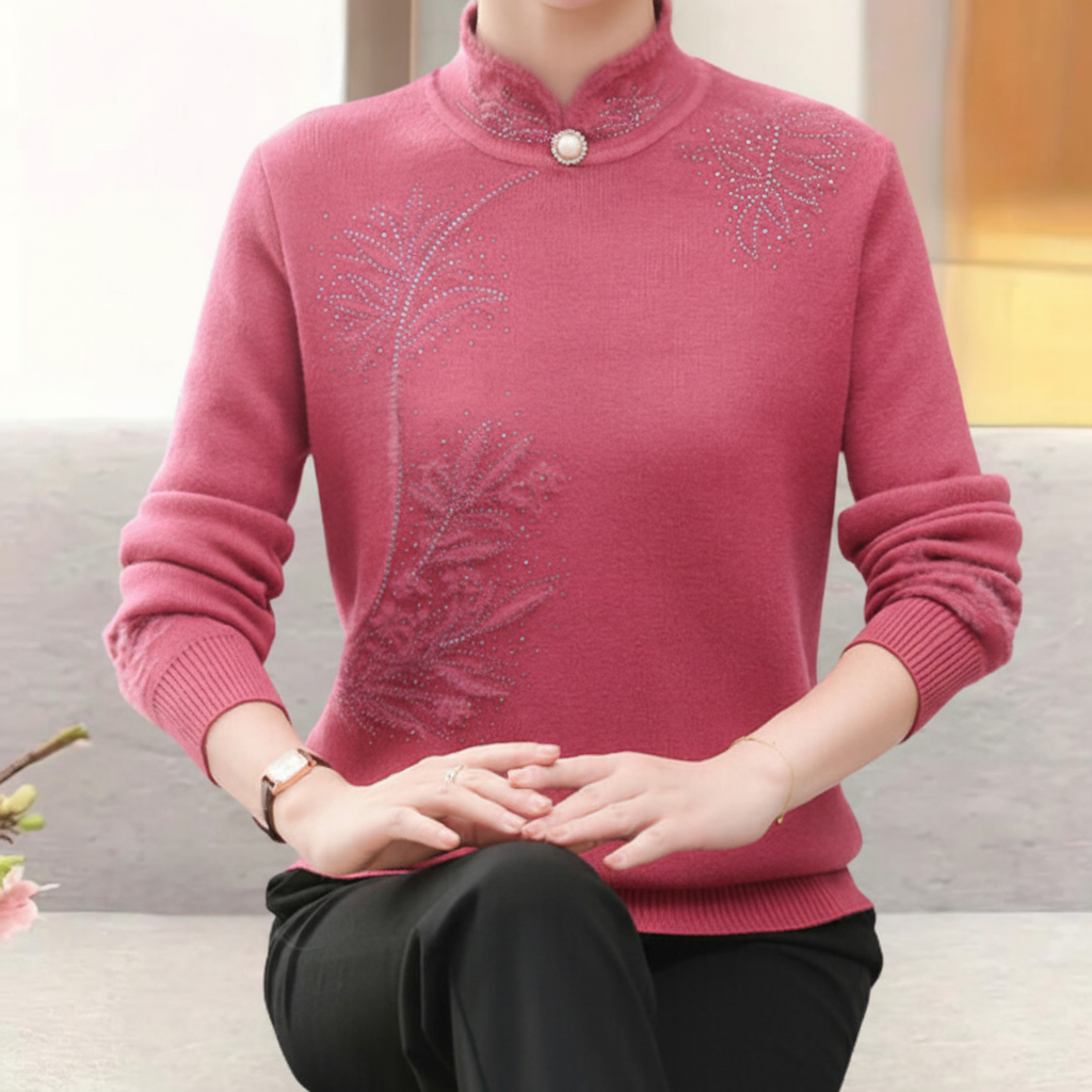 Elegant women's knitted sweater, high collar and long sleeves, with a distinctive floral design for autumn.