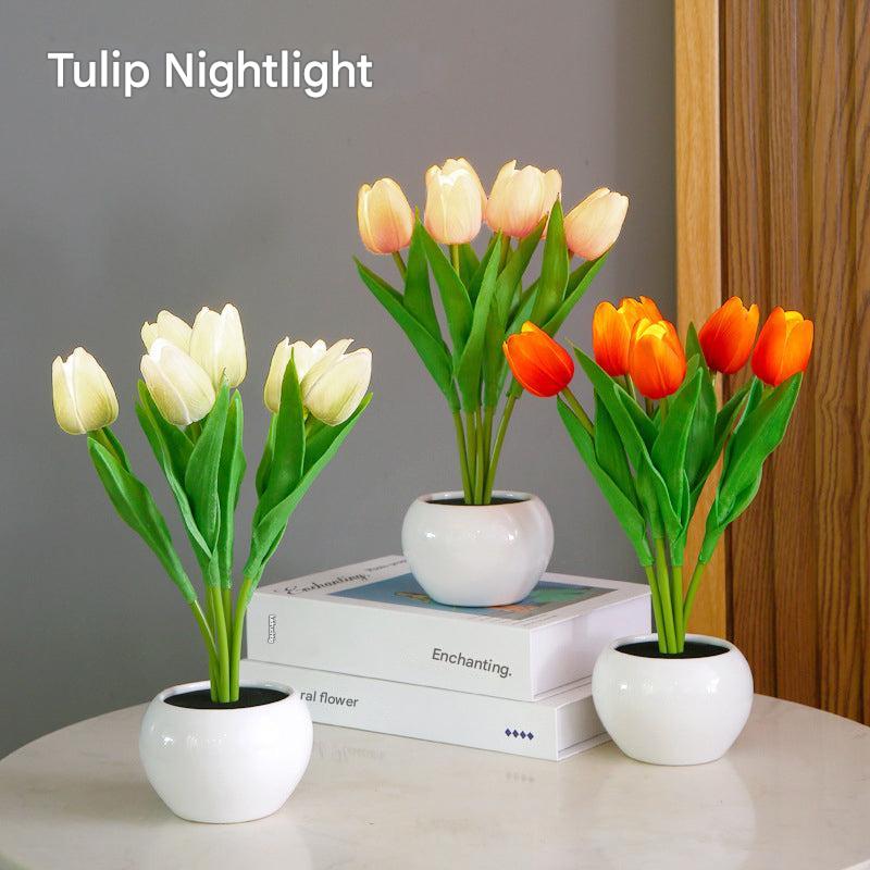Decorative LED tulip lamp on a bedside table, enhancing bedroom decor with soft light.