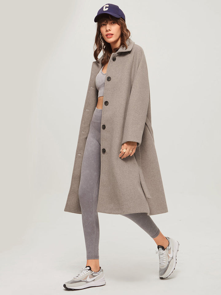 Premium long winter coat for women, ensuring warmth & elegant style. A key piece of fashion outerwear for the cold season.