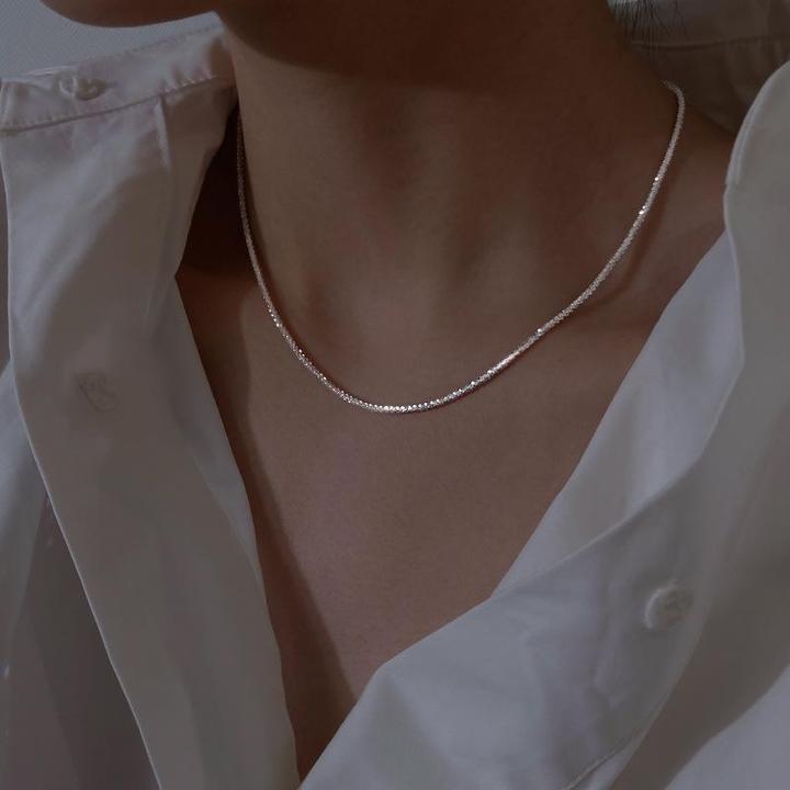Graceful minimalist necklace, adding elegance to any women's outfit.