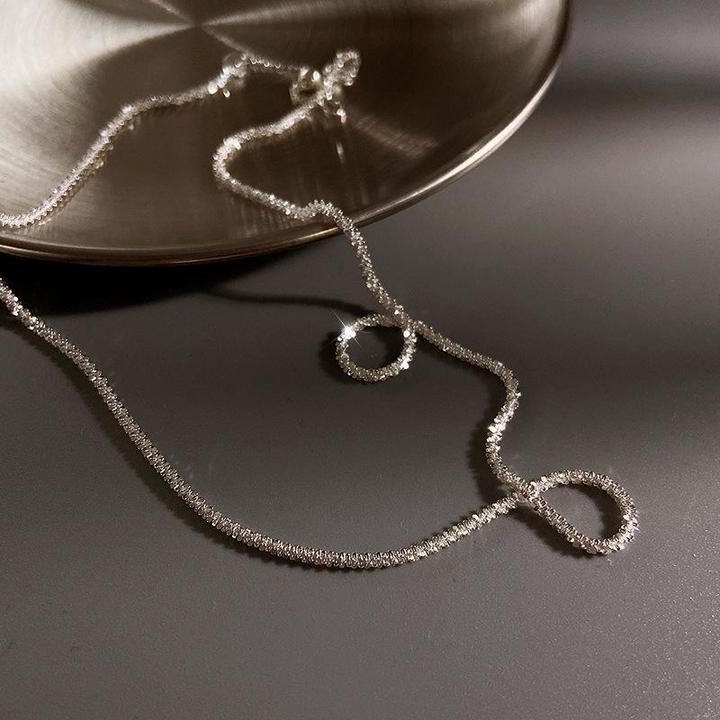 Beautiful minimalist silver-tone necklace, an elegant jewelry piece.