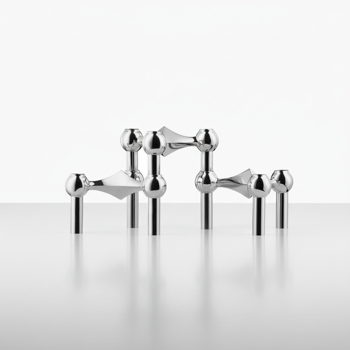 Close-up of Shinexis modular candle holder, sleek stainless steel, minimalist design.