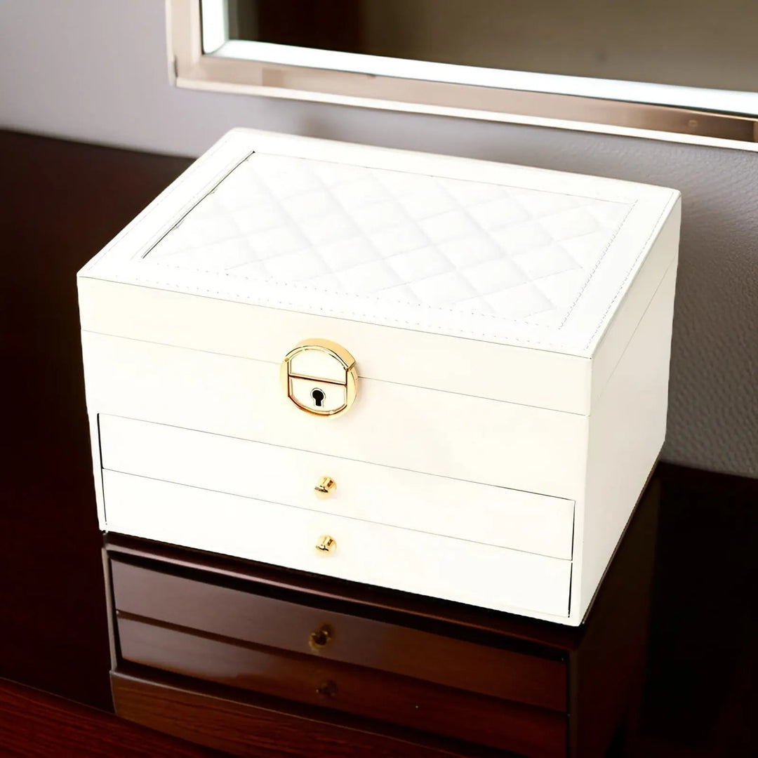 Open multi-layer vegan leather jewelry box with compartments for rings, earrings, and watches, a true EleganceBox.