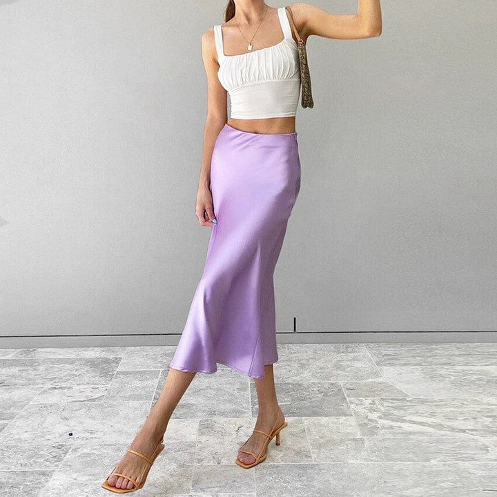 Satin shimmering A-line high-waist midi skirt for women. Chic, perfect for sophisticated outfits.