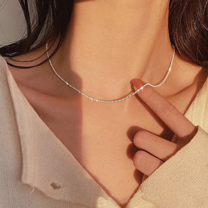 Elegant silver choker necklace for women, perfect collarbone jewelry. Dainty and minimalist sterling silver design.