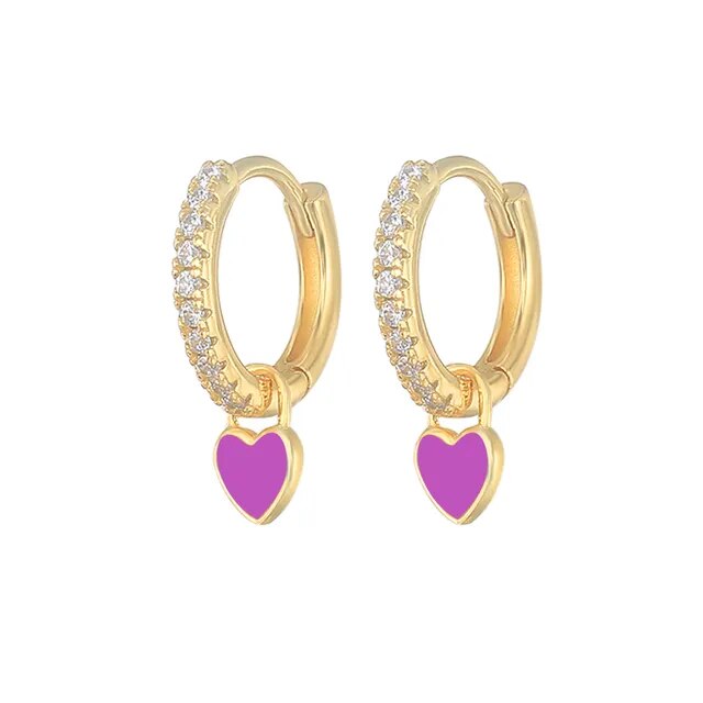 Contemporary silver hoop earrings, women's fashion-forward jewelry.