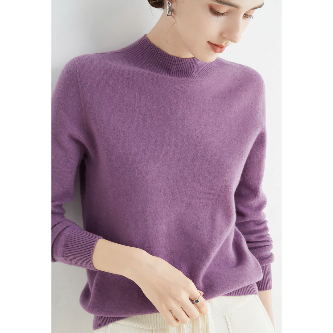 Soft knit long sleeve women's pullover sweater, elegant and comfortable for versatile fall & winter fashion.