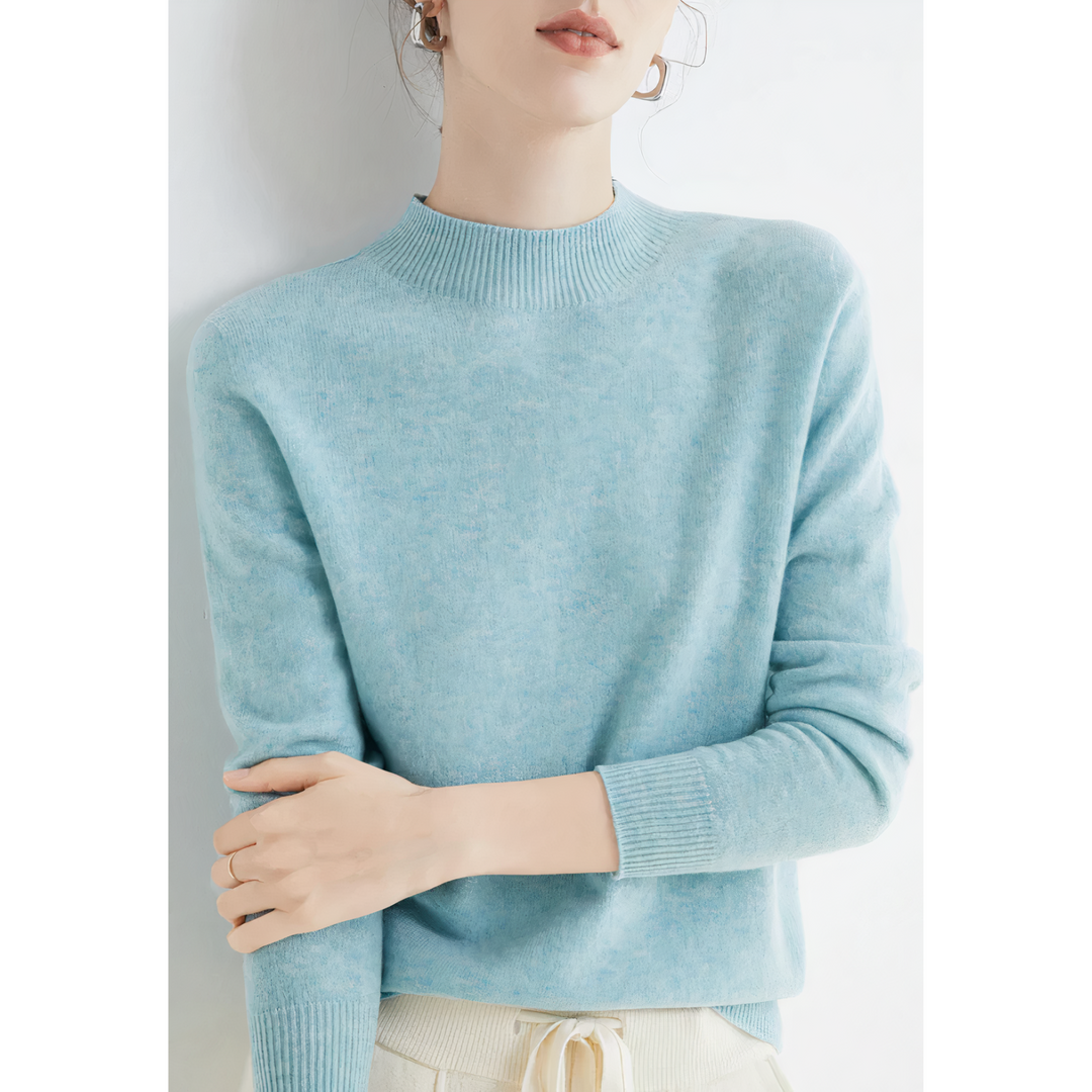 Chic women's soft knit pullover sweater with long sleeves, perfect for elegant winter fashion & casual luxury.