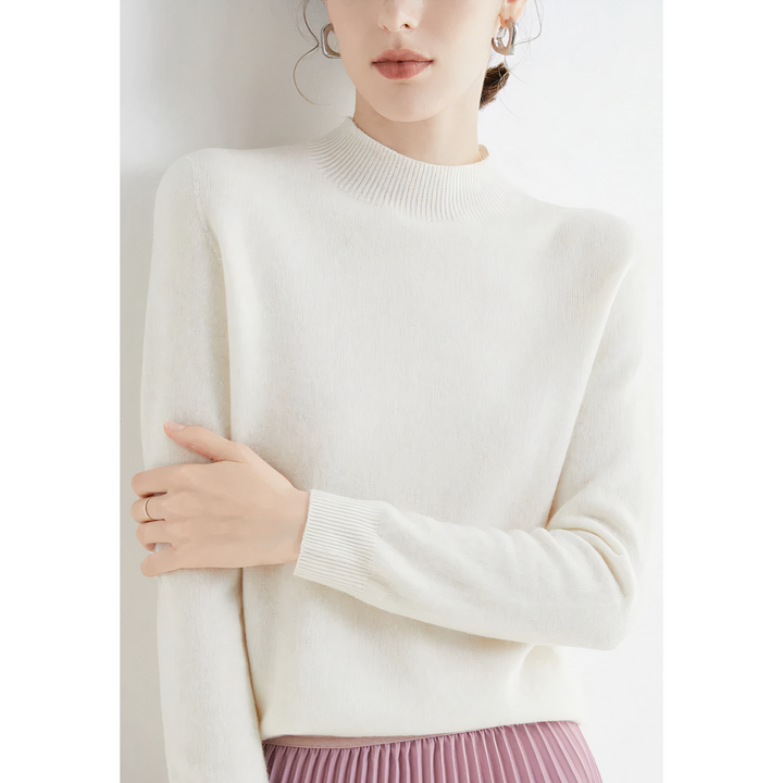 Cozy & soft knit long sleeve pullover sweater for women, offering comfortable elegance in fall & winter fashion.