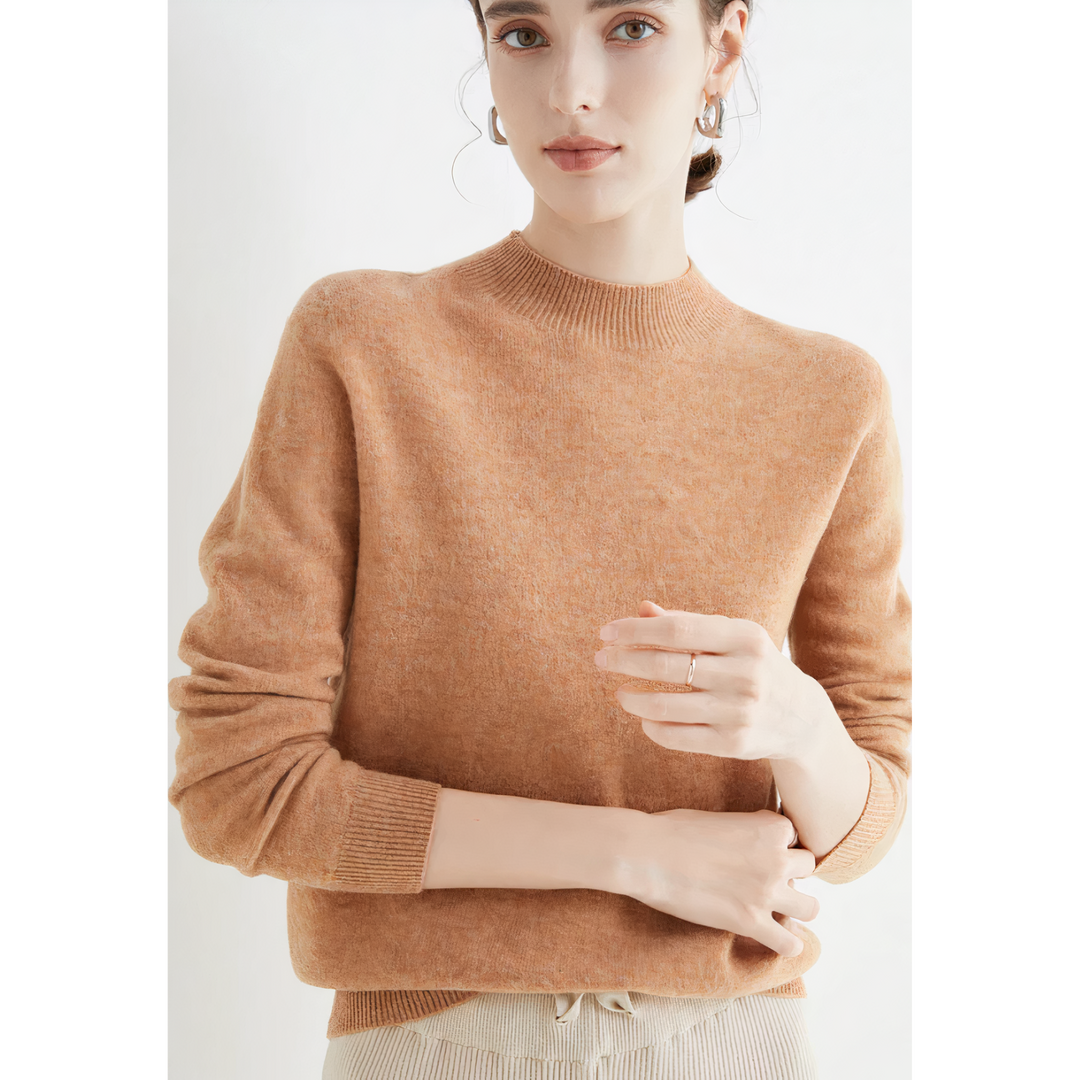 Women's elegant long sleeve pullover sweater, featuring a soft knit fabric for comfortable fall & winter style.