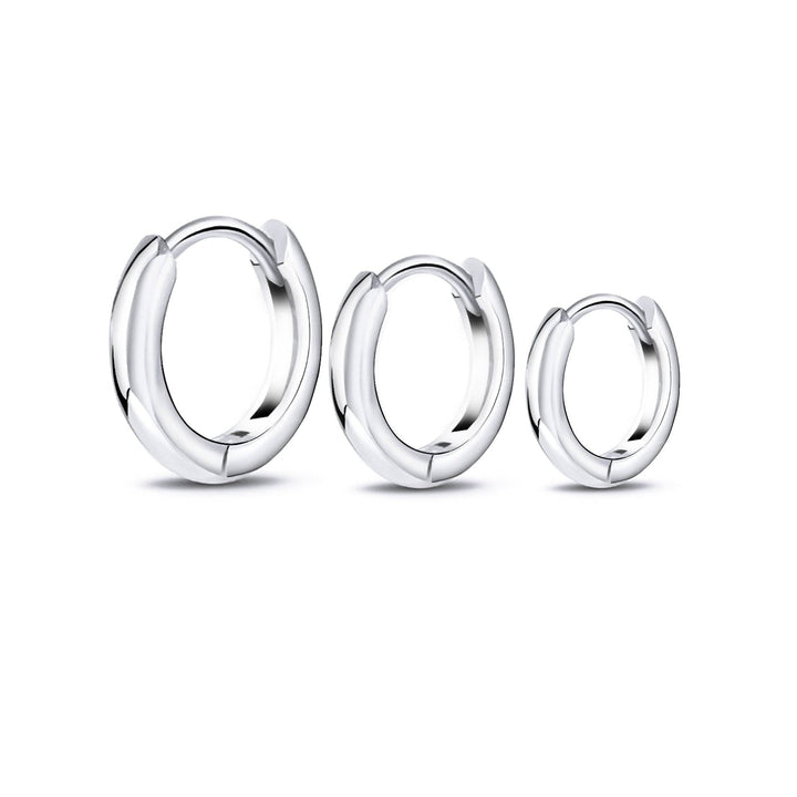 Elegant sterling silver 3-ring hoop earrings for women. Versatile fashion jewelry, perfect as a gift.