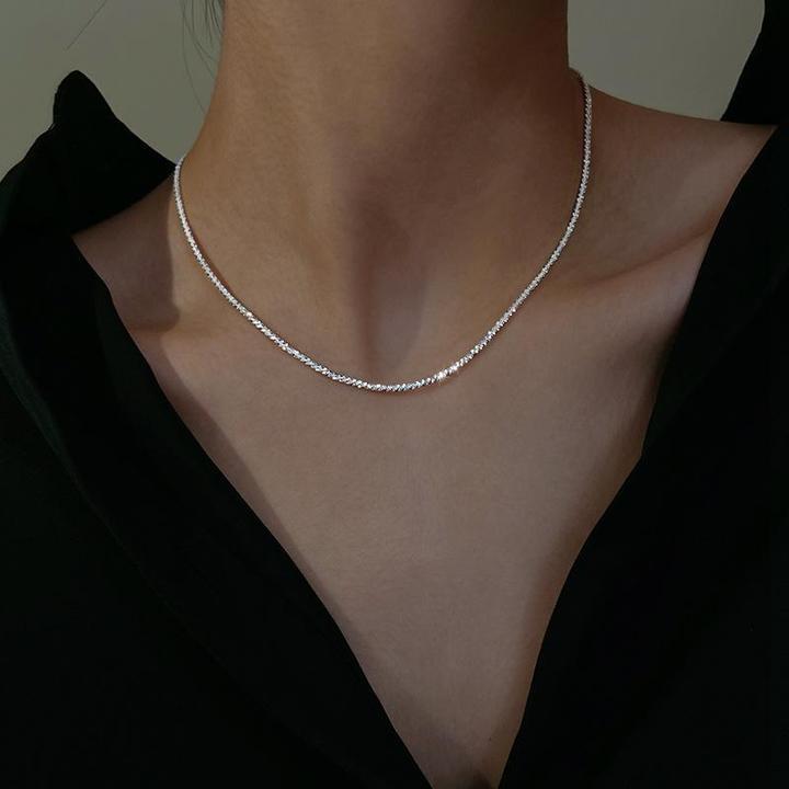 Dazzling sterling silver starlight necklace and matching earrings, an elegant and sparkling fine jewelry gift for her.
