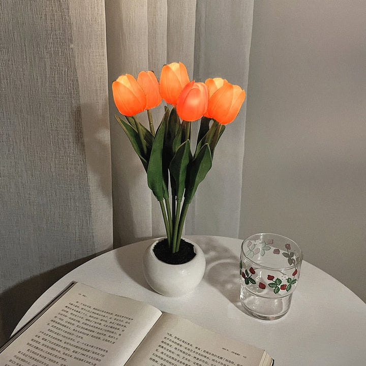 Portable tulip LED night light, USB or battery powered, for elegant ambient lighting.