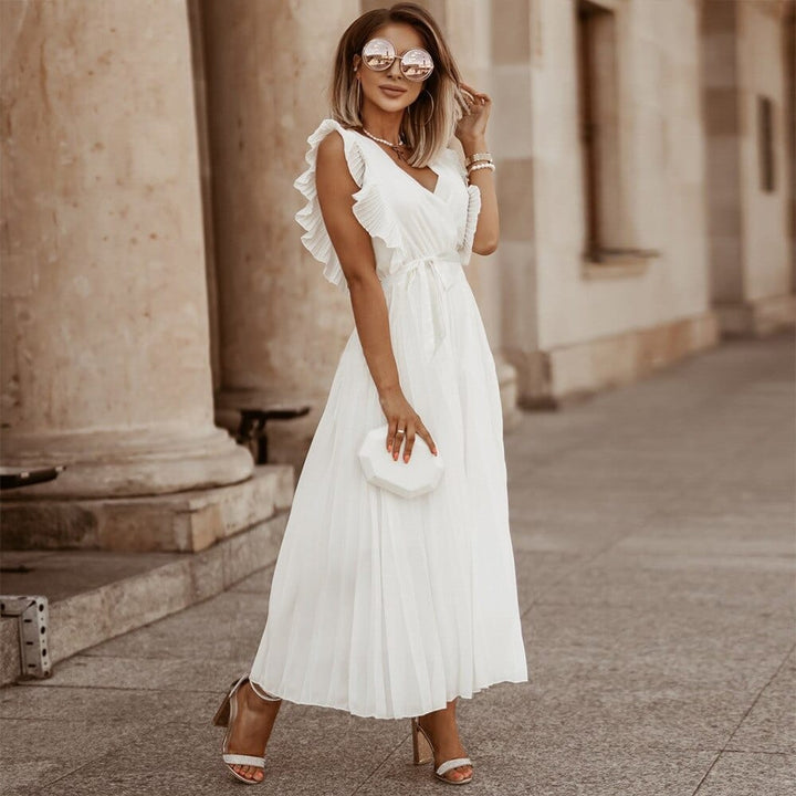 Elegant white bohemian V-neck maxi dress for women, perfect for summer parties or beach holidays.