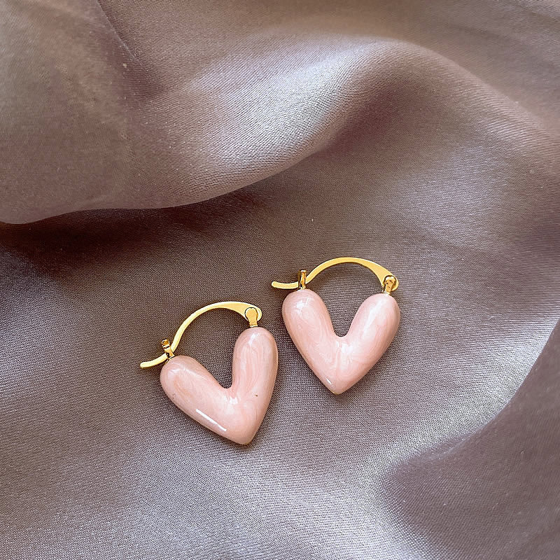 Perfect gift: elegant white teardrop dangle earrings for women. Love Collection gold-plated fashion jewelry.