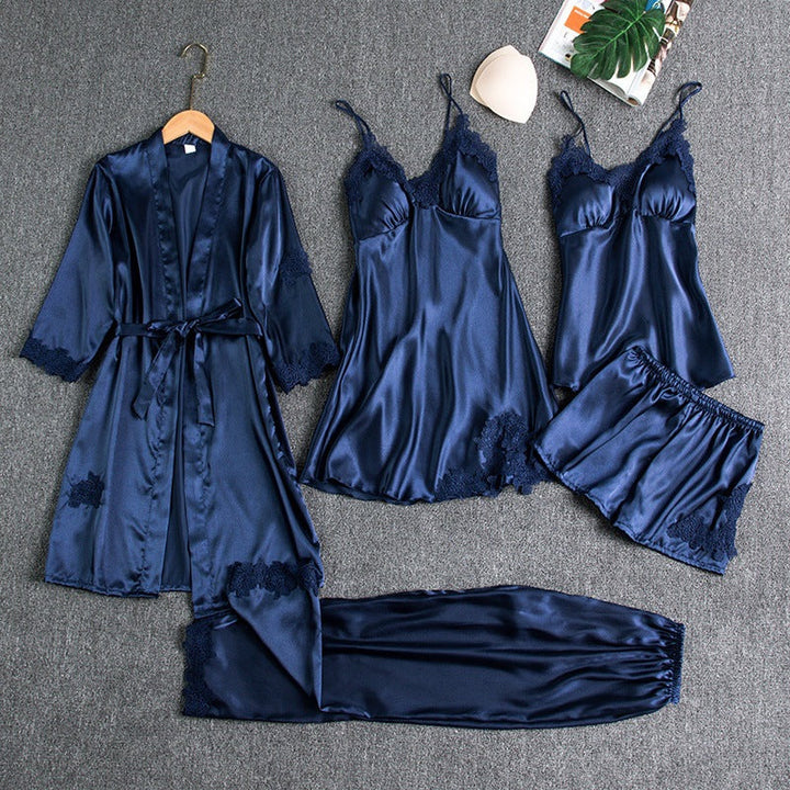 Luxurious women's multi-piece satin pajama set featuring a soft robe, lace camisole, shorts, and long pants.