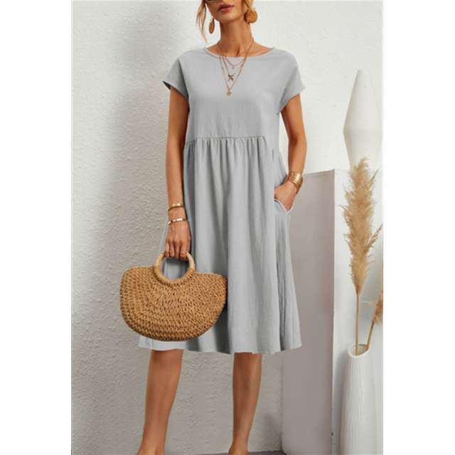 Elise A-line midi dress, a women's fashion bestseller. Elegant short sleeve design, perfect for any event.
