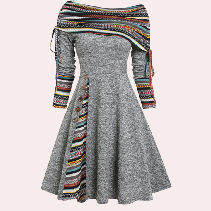 Stylish women's midi A-line dress featuring a unique accent print. A comfortable and elegant choice for summer fashion.