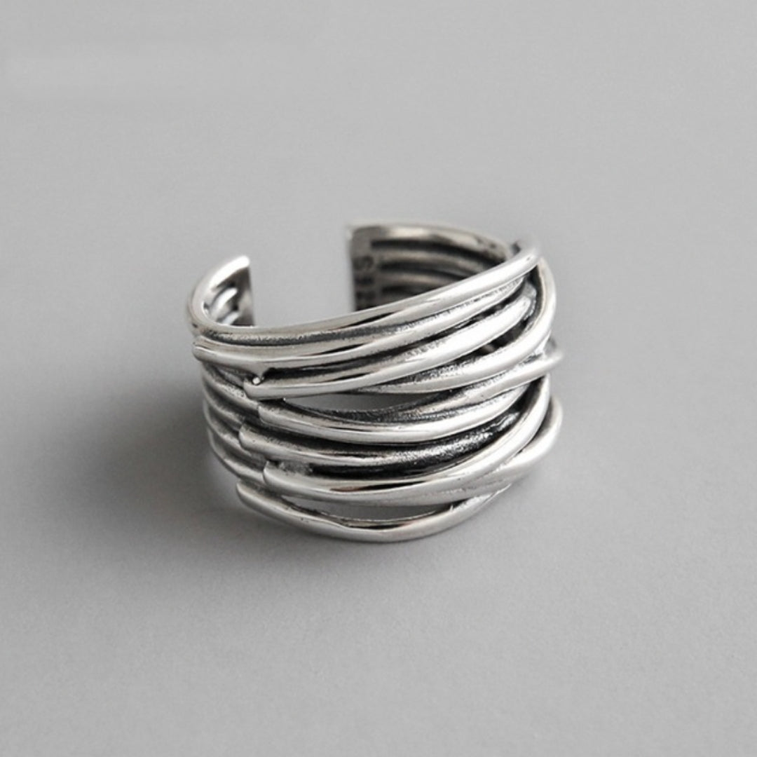 Elegant women's adjustable sterling silver stacking ring. Perfect layered fashion jewelry, a stylish gift for her.