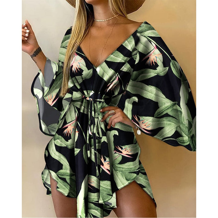 Elegant women's batwing sleeve mini dress with V-neck. A stylish and comfortable short casual summer dress.
