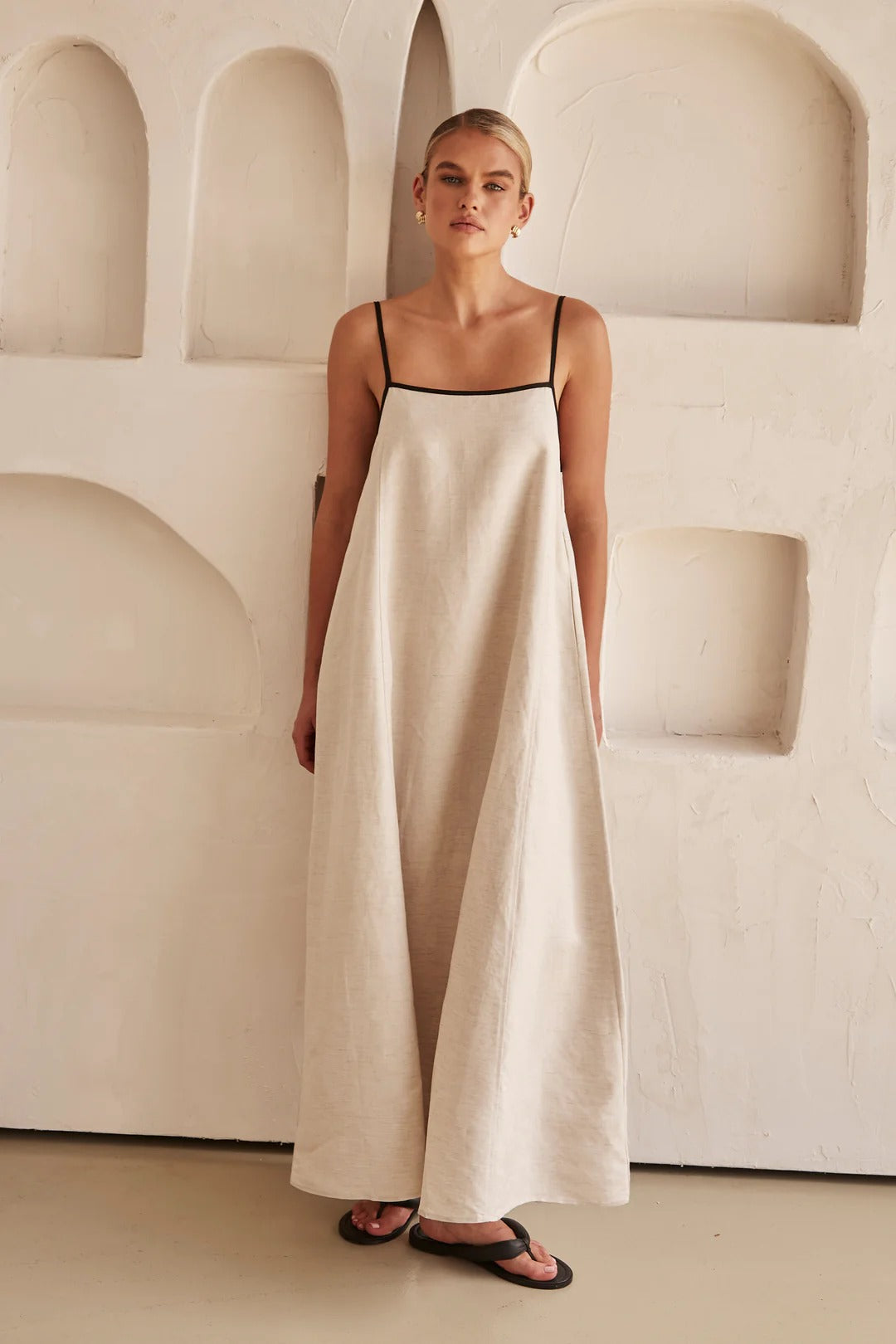 Elegant women's beige midi summer dress, perfect for chic casual or party wear. Flowy and sophisticated.