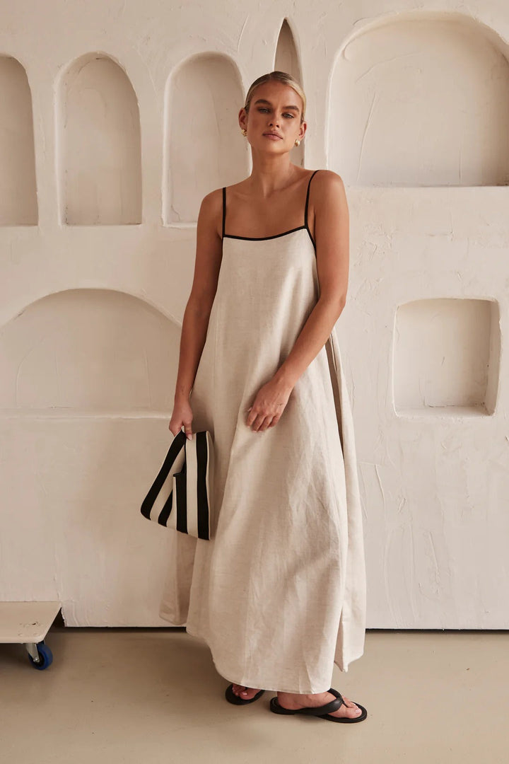 Effortless style with this elegant women's beige summer midi dress. Flowy design, perfect for casual or party events.