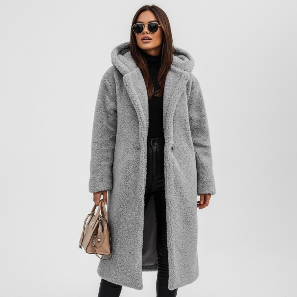 Women's trench coat styled with winter accessories, demonstrating its versatility as outerwear