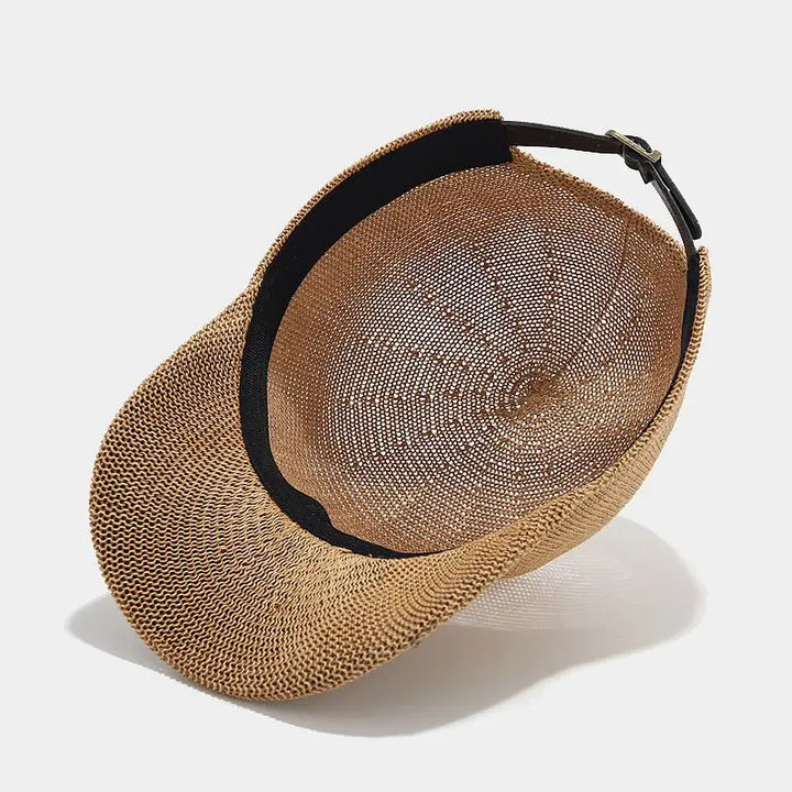 Trend-setting women's braided sun hat with wide brim, a must-have fashion accessory for UV protection.