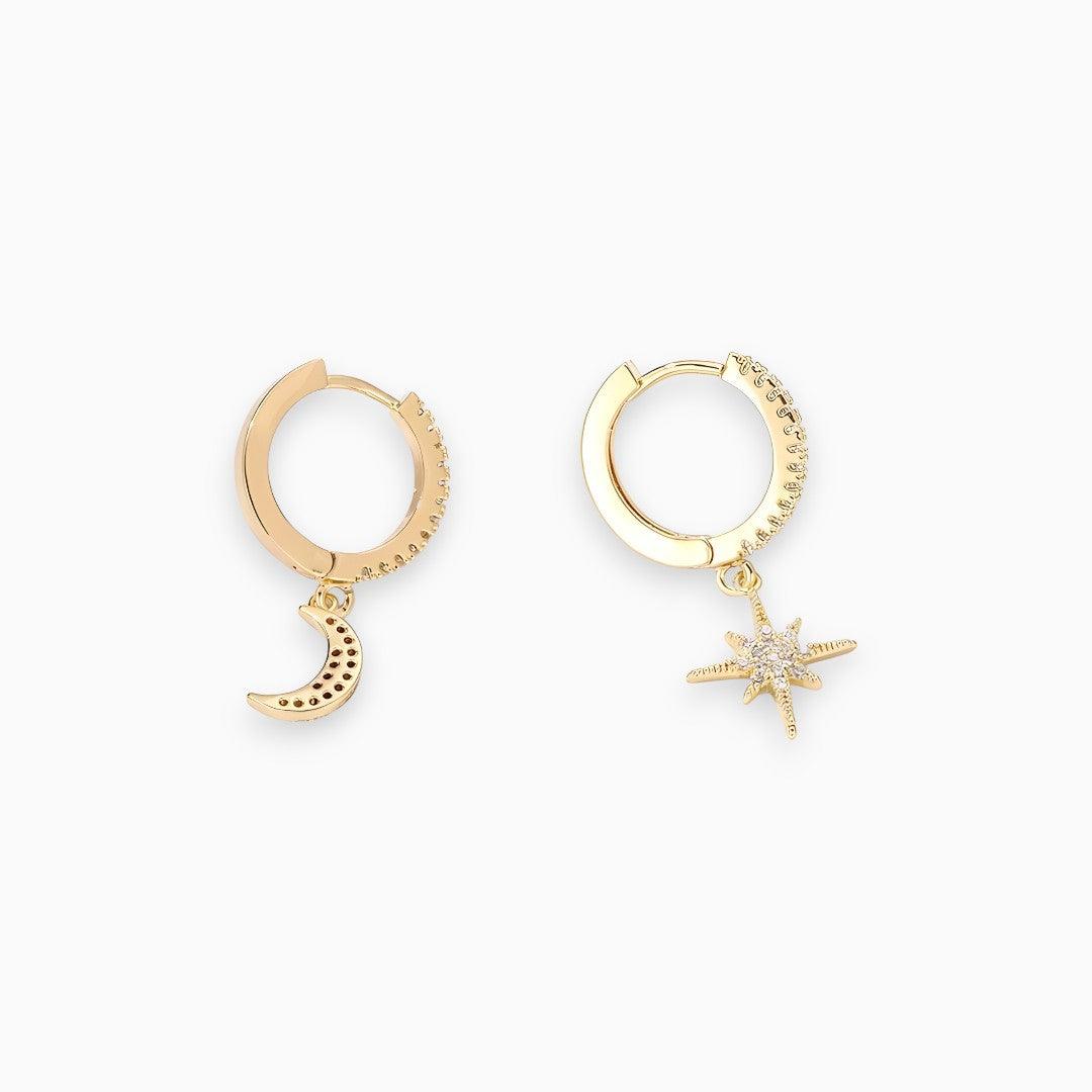 Elegant women's celestial sparkle drop earrings with a starry sky design, available in gold or silver. Fashion jewelry.