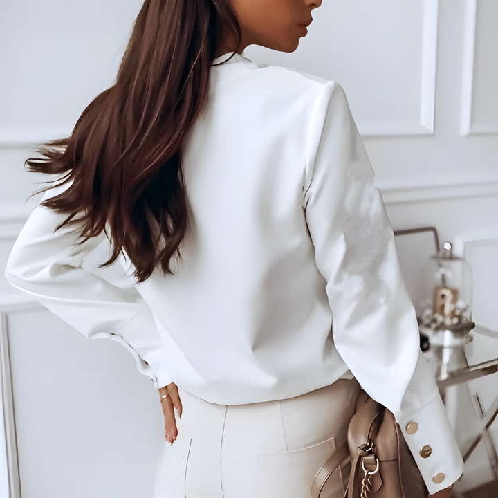 Elegant women's classic button-down shirt with long sleeves & collar. Perfect for office wear or casual everyday style.