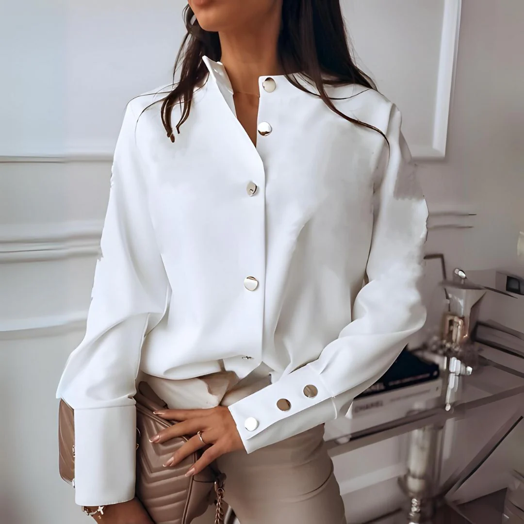 Versatile women's button-down shirt. Elegant long-sleeve blouse with collar, suitable for office & casual fashion.