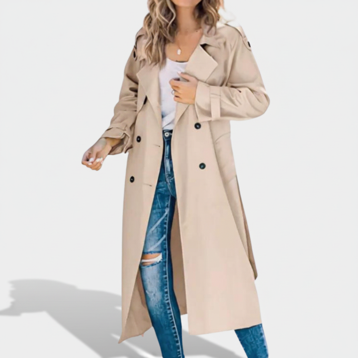 Close-up of the double-breasted detailing on a women's trench coat, suitable for winter outerwear