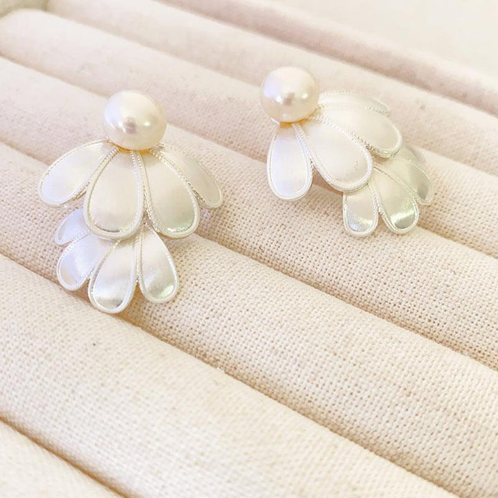 Lunara silver flower petal drop earrings with double layered design and pearl accent for women.