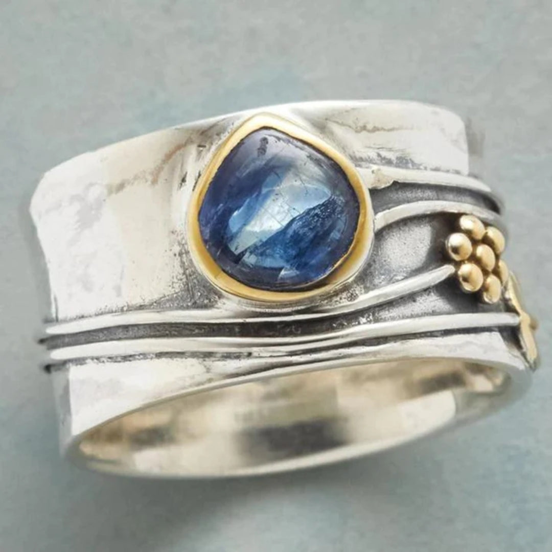 Elegant Women's Esme vintage silver ring with a striking blue gemstone, perfect for a classic statement. Gift for her.