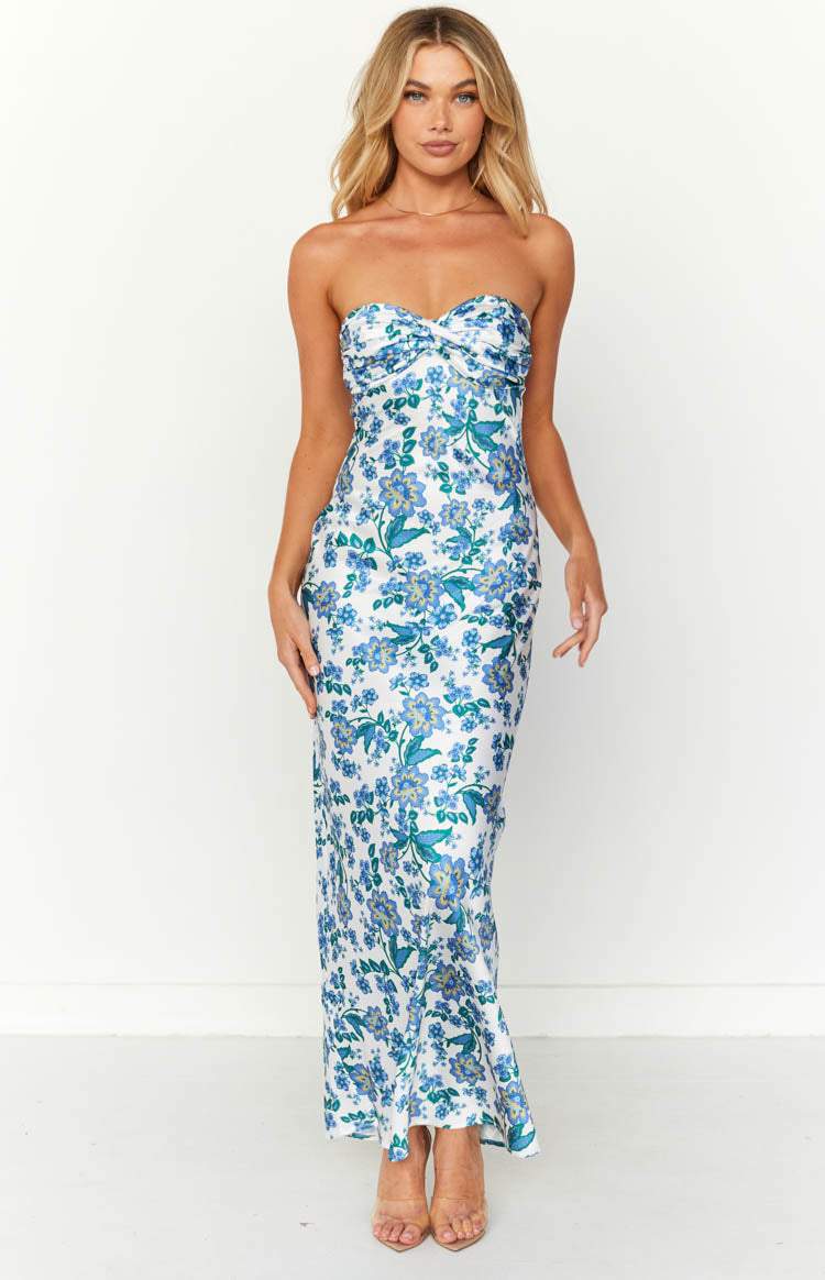 Elegant women's floral knotted tube maxi dress in blue print, perfect for summer evenings.
