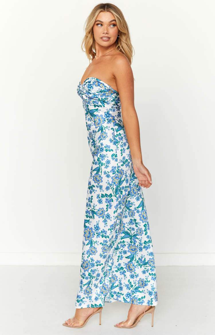 Close-up of the blue floral print on a women's knotted tube maxi dress, soft fabric.