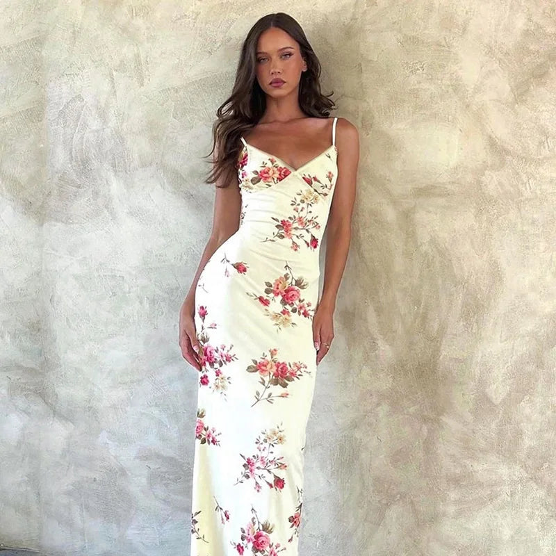 Alina floral summer maxi dress for women, featuring a flattering V-neck and delicate spaghetti straps.