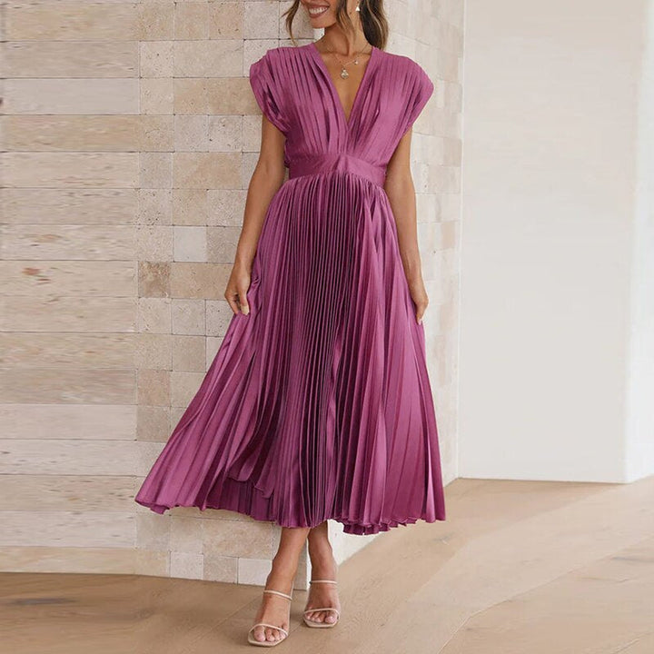Elegant women's flowing pleated V-neck maxi dress, perfect for summer casual wear or evening events.