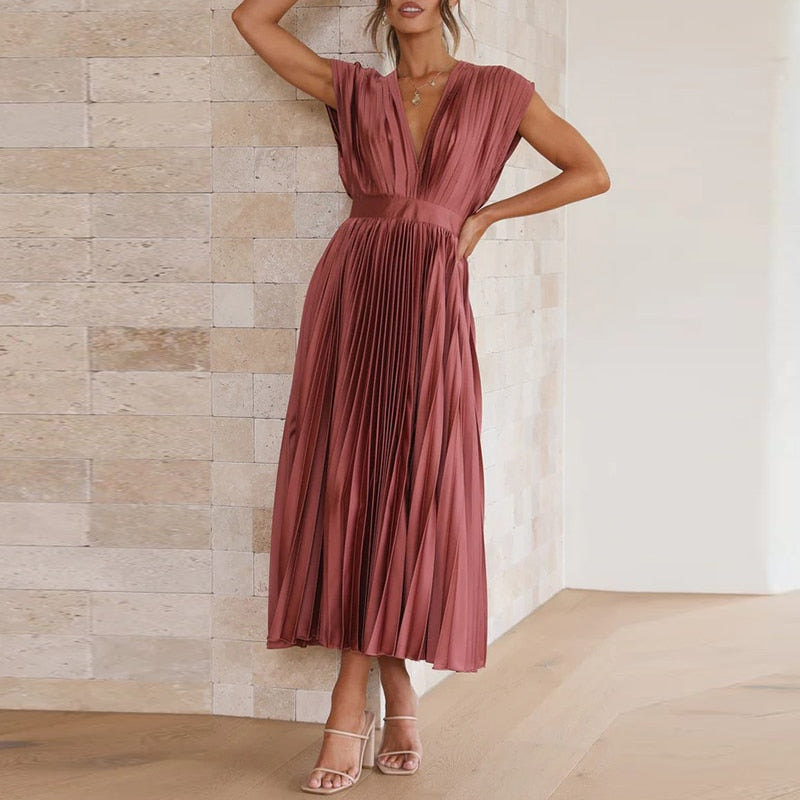 Versatile ladies' apparel: flowing pleated V-neck maxi dress, a fashionable choice for any event.